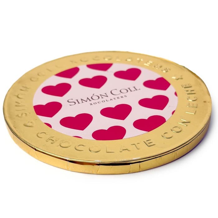 Simón Coll Chokladmedalj Ljus Choklad 60g – från Simón Coll – 35 kr – hos Delitea