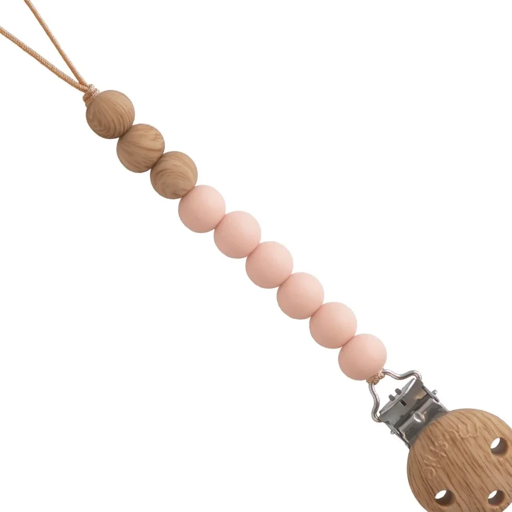 Mushie Pacifier Clip Eva Blush från Mushie – köp hos Apotek Hjärtat