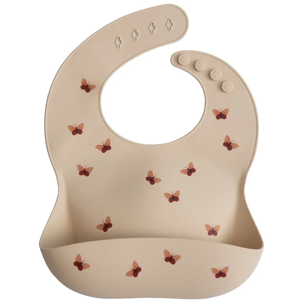 Mushie Silicone Bib Butterflies från Mushie – köp hos Apotek Hjärtat