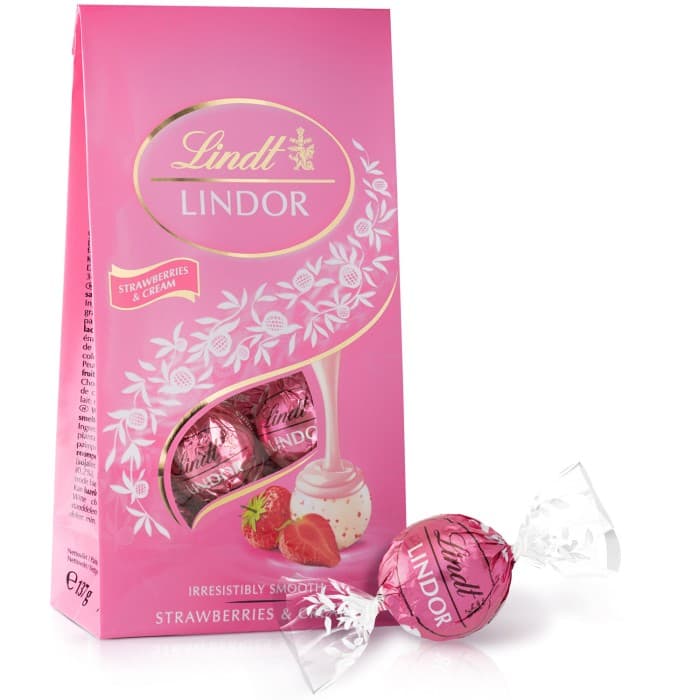 Lindt LINDOR Strawberries & Cream Vita Chokladpraliner 137g – från Lindt – 65 kr – hos Delitea